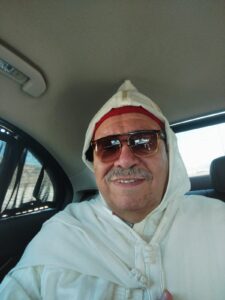 صورة لعبد الله بوصوف وهو في طريقه لحضور حفل ولاء عيد العرش